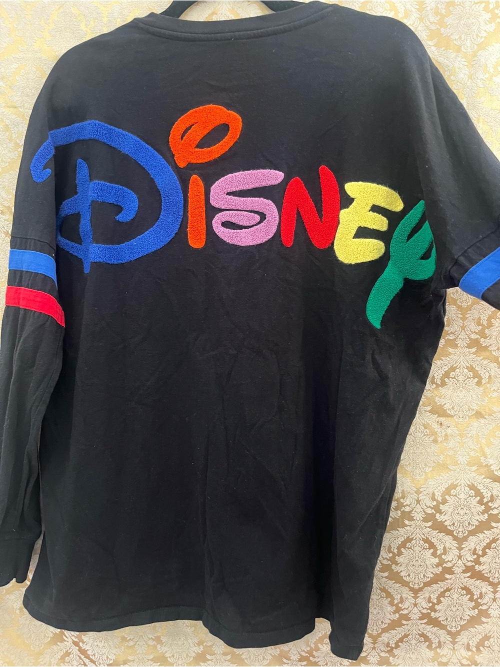 Disney Black Long Sleeve Spirit Jersey type Tee with Multicolor Chenille Logo